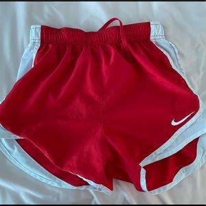 Red nike shorts, mesh still intact, size small